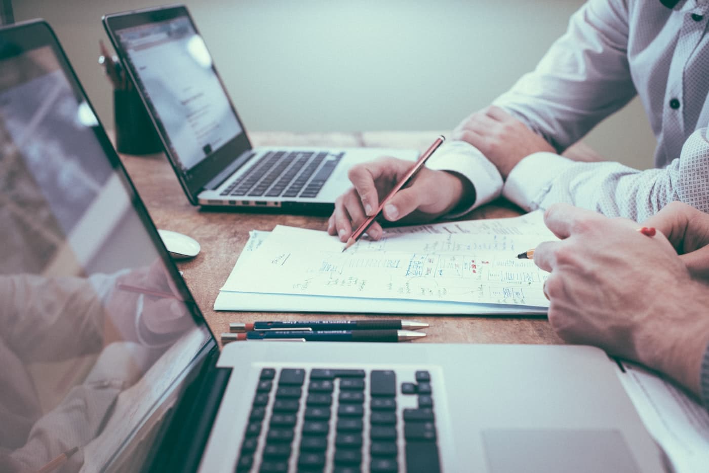 Owner reviewing operational figures on a laptop